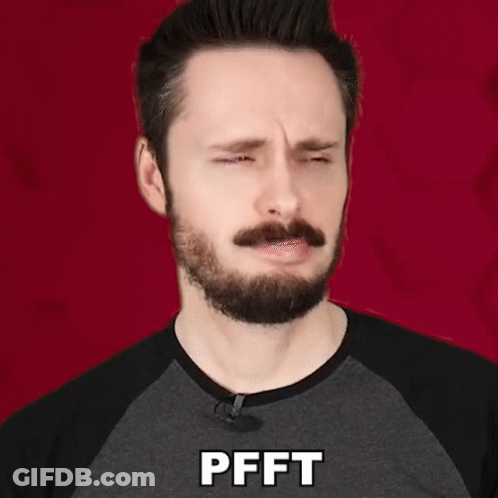 Man With Beard And Mustache In Gray Shirt Saying Pfft GIF