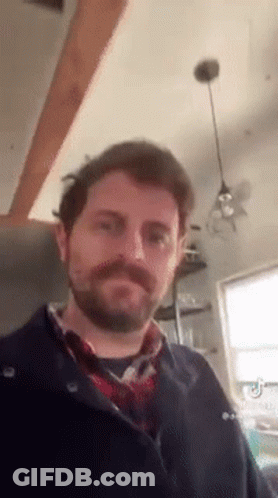 Man With Beard And Mustache In Kitchen GIF