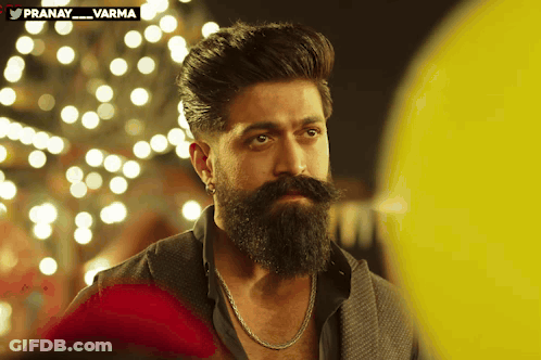Man With Beard And Mustache Looking GIF