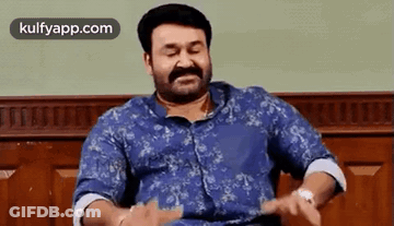 Man With Beard And Mustache Sitting Eyes Closed GIF