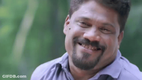 Man With Beard And Mustache Smiling GIF