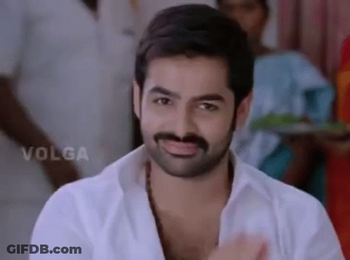 Man With Beard And Mustache Smiling In White Shirt GIF