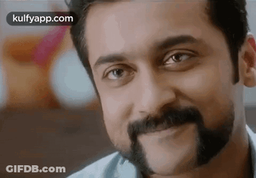 Man With Beard And Mustache Smiling GIF