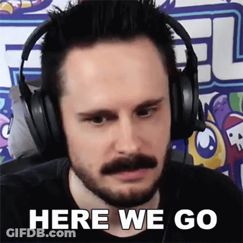Man With Beard And Mustache Wearing Headphones Saying Here We Go GIF
