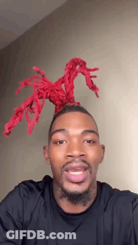 Man With Beard And Red Dreadlocks Smiling GIF