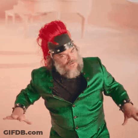 Man With Beard And Red Hair In Green Jacket And Red Hat GIF