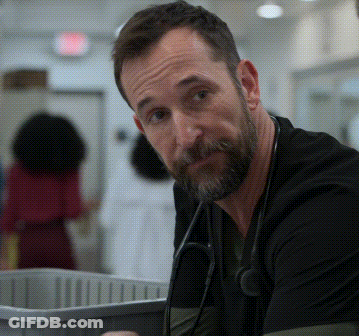Man With Beard And Stethoscope Looking At Camera GIF