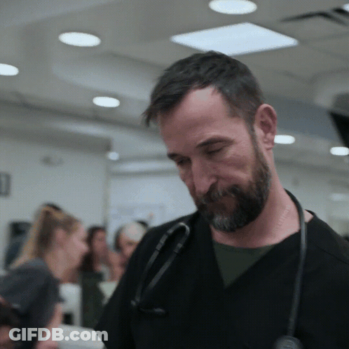 Man With Beard And Stethoscope Looking Down GIF