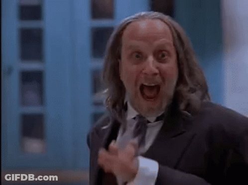 Man With Beard And Suit Making Funny Face GIF