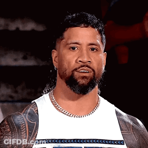 Man With Beard And Tattoos In White Tank Top GIF