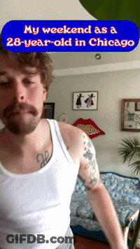 Man With Beard And Tattoos In White Tank Top GIF