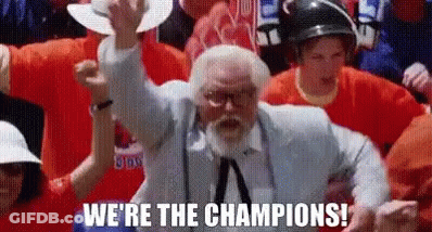 Man With Beard And Tie Raising Fist GIF