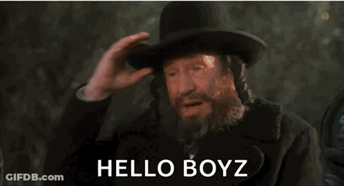 Man With Beard And Top Hat Saying Hello Boyz GIF