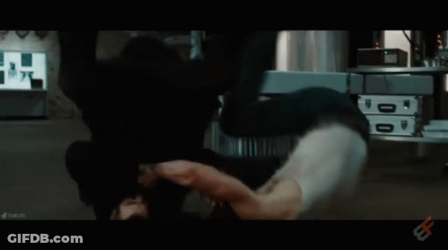 Man With Beard And White Tank Top Arms Out GIF