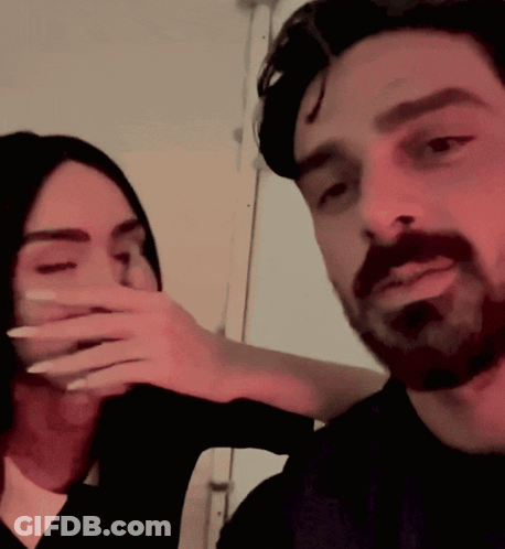 Man With Beard And Woman Covering Face GIF