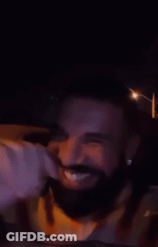 Man With Beard And Yellow Shirt Smiling GIF