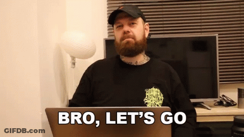 Man With Beard At Laptop Saying Bro Let's Go GIF
