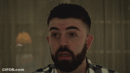 Man With Beard Behind Wait Wait Wait Sign GIF