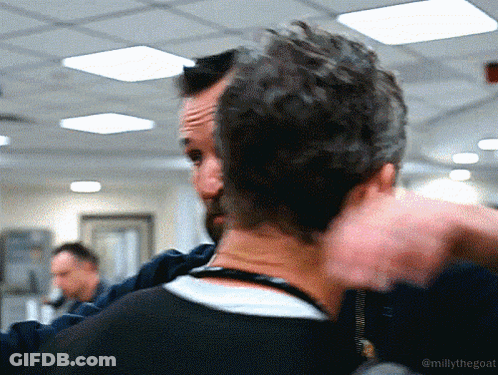 Man With Beard Being Hugged By Another Man GIF