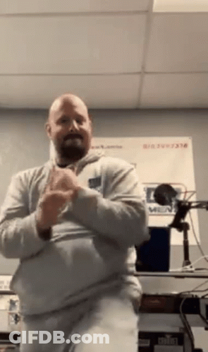 Man With Beard Clapping In Room GIF