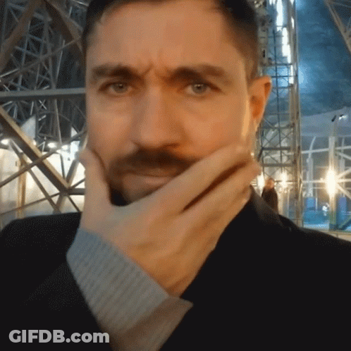 Man With Beard Covering Face GIF