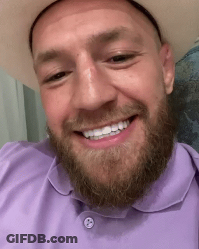 Man With Beard Cowboy Hat And Purple Shirt GIF