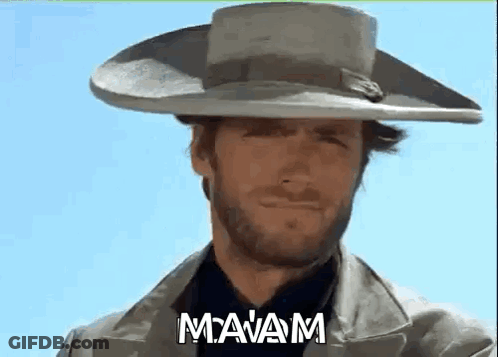Man With Beard Cowboy Hat Standing In Desert GIF