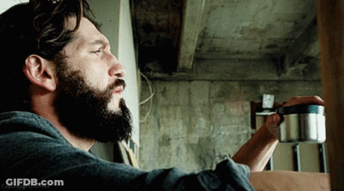 Man With Beard Drinking From Steel Cup GIF