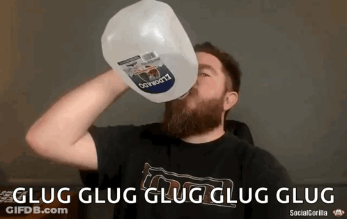 Man With Beard Drinking Gallon Of Water GIF