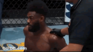 Man With Beard Examined By Doctor In Wrestling Ring GIF