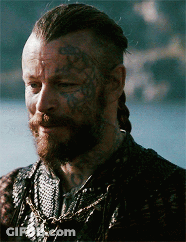 Man With Beard, Face Tattoos, And Chain GIF