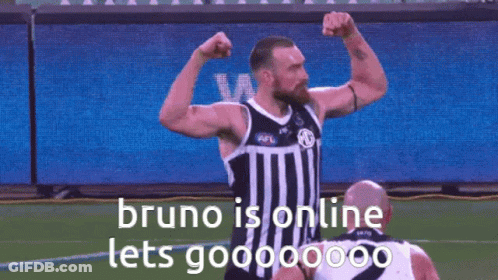 Man With Beard Flexing Muscles GIF