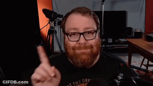 Man With Beard Glasses And Off The Grf Shirt GIF