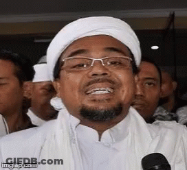 Man With Beard, Glasses, And White Turban Smiling GIF