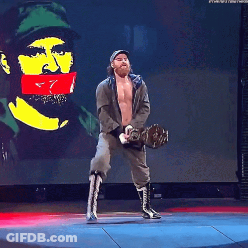 Man With Beard Holding Baseball Bat GIF