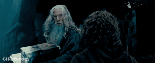 Man With Beard Holding Book GIF