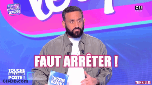 Man With Beard Holding Book Faut Arreter GIF