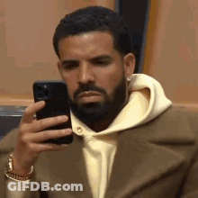 Man With Beard Holding Cell Phone GIF