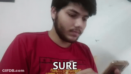 Man With Beard Holding Cell Phone GIF