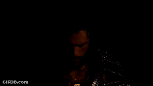 Man With Beard Holding Championship Belt GIF