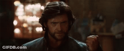 Man With Beard Holding Claws GIF