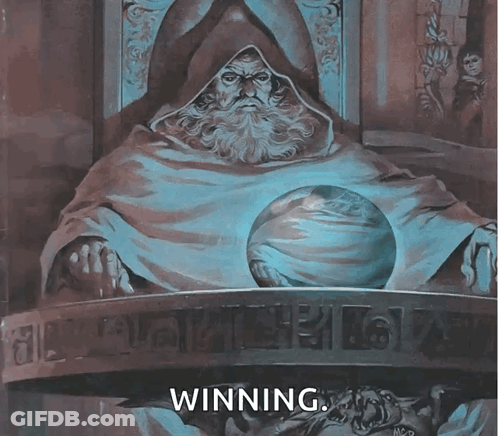 Man With Beard Holding Crystal Ball Saying Winning GIF