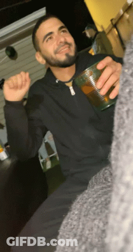 Man With Beard Holding Cup Of Beer GIF