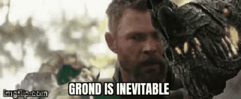 Man With Beard Holding Dinosaur Statue GIF
