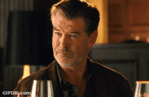 Man With Beard Holding Glass Of Wine GIF