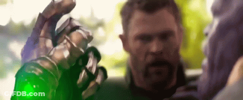 Man With Beard Holding Green Glove GIF