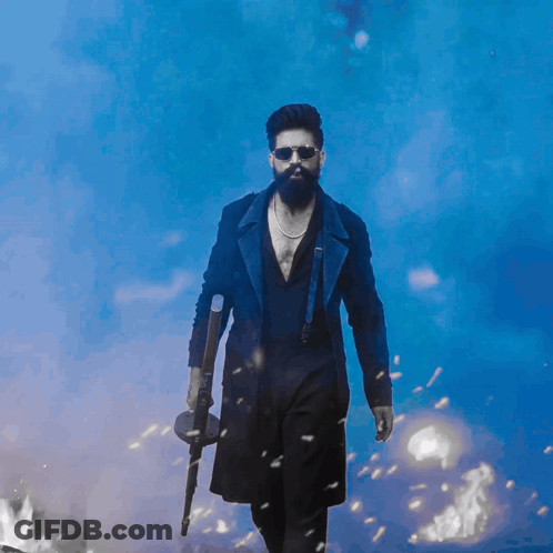 Man With Beard Holding Gun GIF