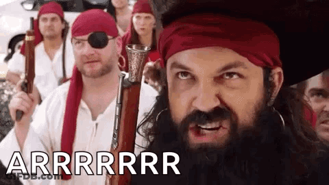 Man With Beard Holding Gun GIF