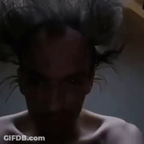 Man With Beard Holding Head GIF
