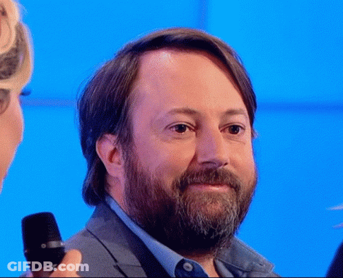 Man With Beard Holding Microphone GIF